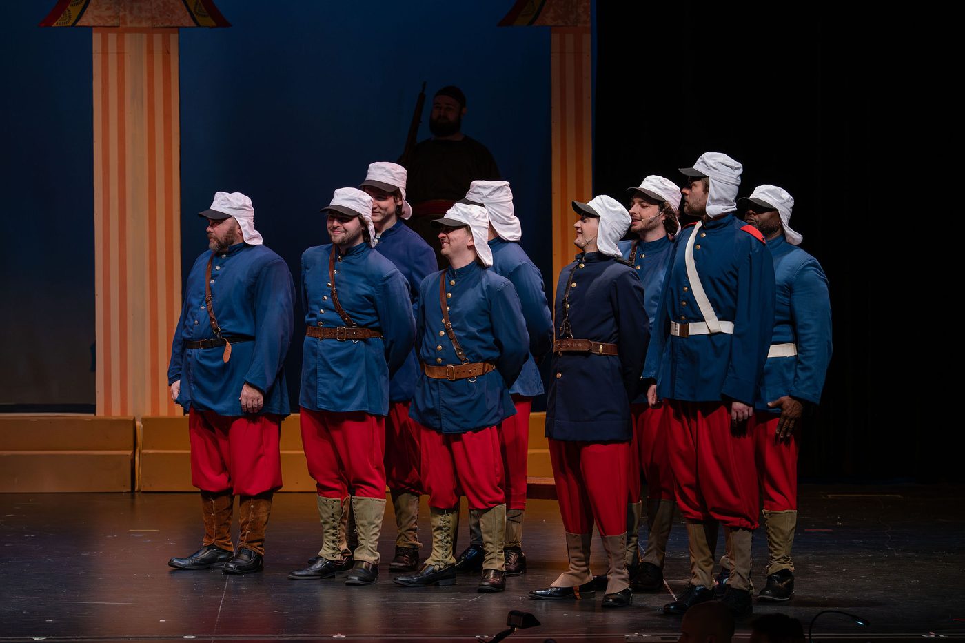 The Legionnaire company in blue tunics and red trousers