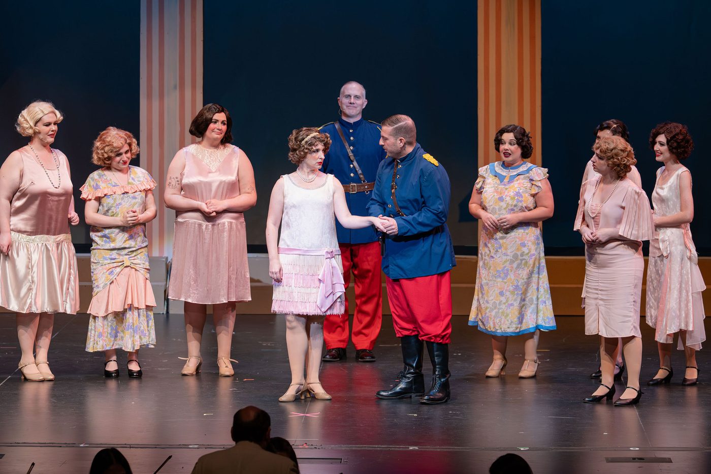 The finale, the company gathered around the center pair